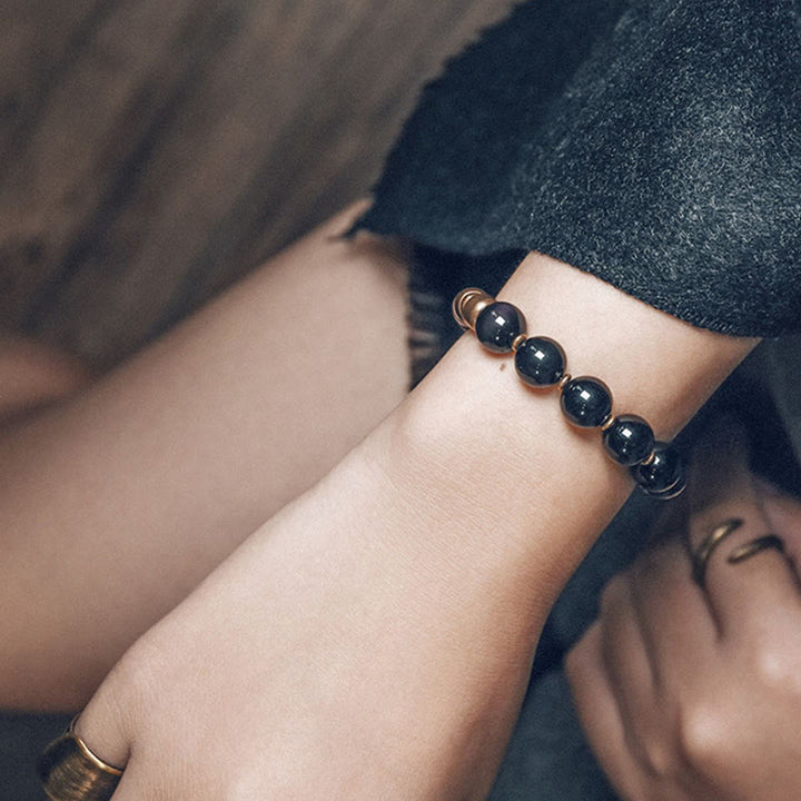 Bracelet de guérison en cuivre Buddha Stones et pierre de lave, obsidienne arc-en-ciel