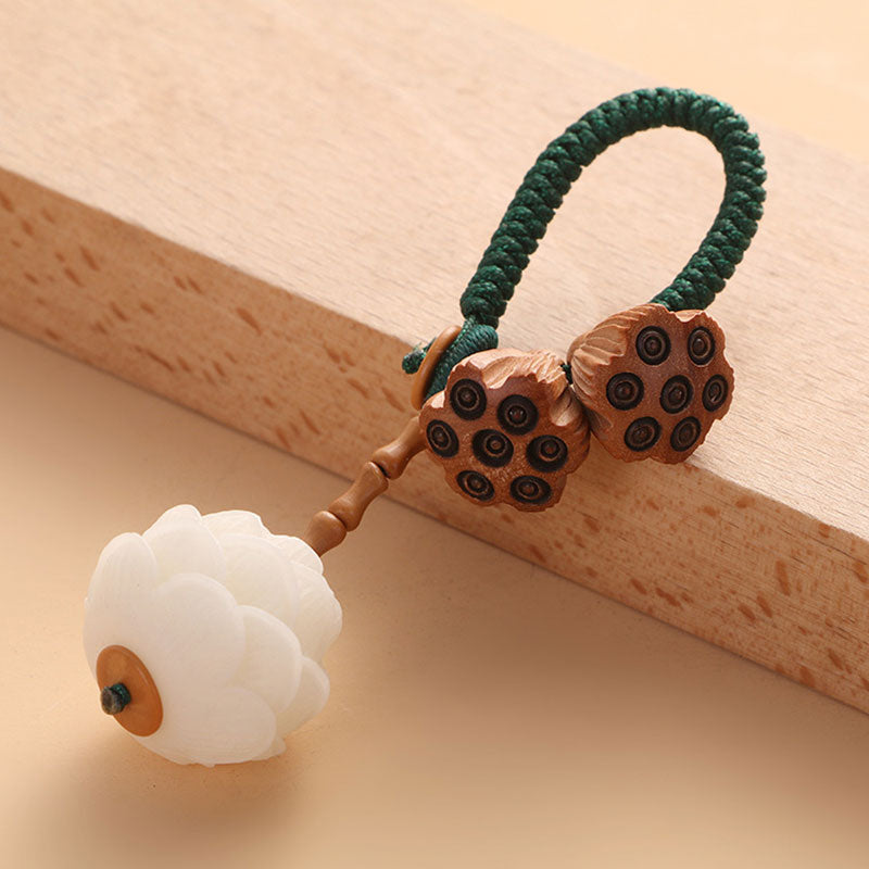 Porte-clés porte-bonheur en bois de pêcher avec pierres de Buddha Stones et lotus naturel blanc - image 1