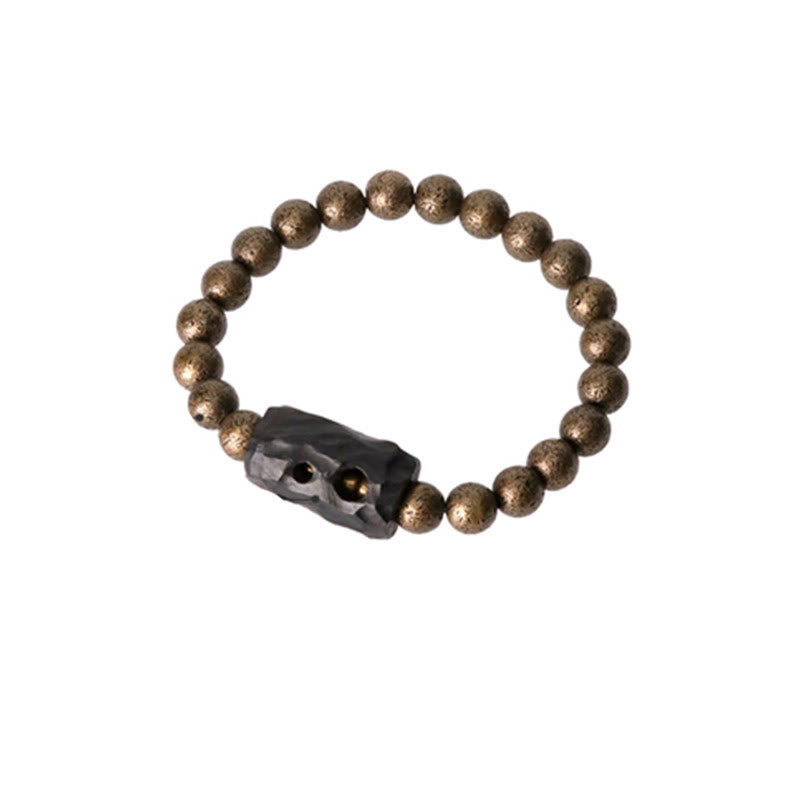 Bracelet de perles en bois d'ébène et cuivre avec Buddha Stones et équilibre