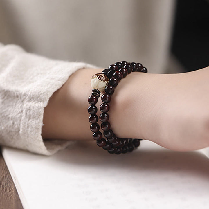 Bracelet double tour sculpté en Buddha Stones, petite feuille, bois de santal rouge, lotus, graine de Bodhi, protection