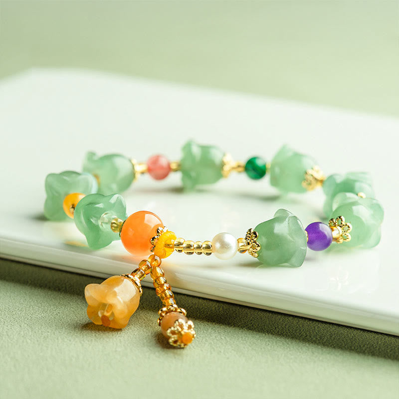 Bracelet porte-bonheur en aventurine verte et fleur de magnolia de Buddha Stones