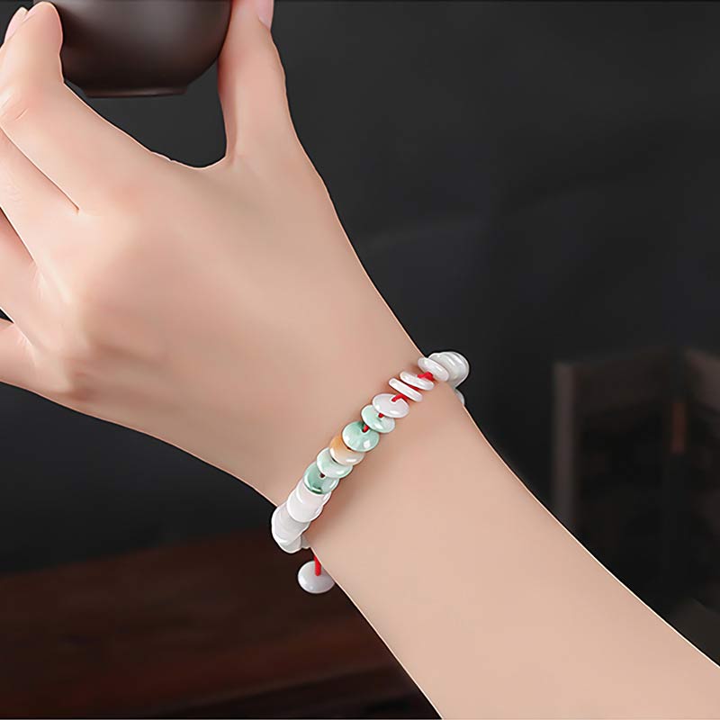 Bracelet tissé en fil rouge porte-bonheur en jade rond avec Buddha Stones