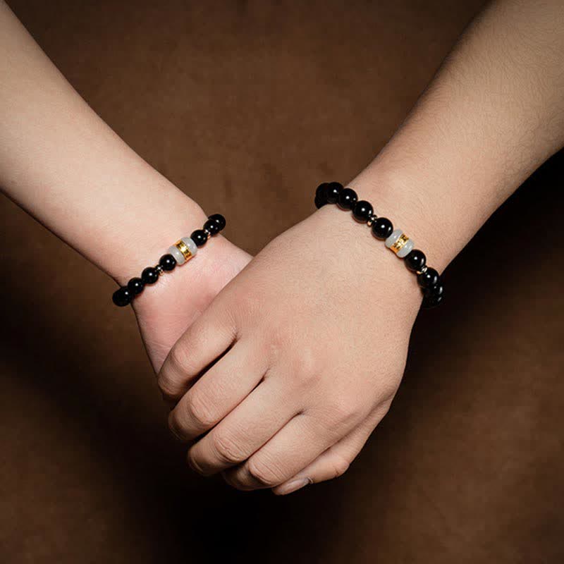 Bracelet magnétique pour couple en obsidienne Buddha Stones et jade Om Mani Padme Hum