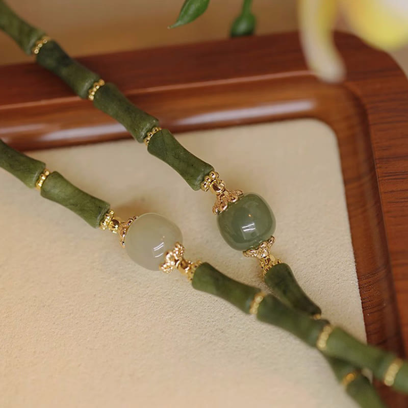 Bracelet porte-bonheur en jade Hetian péridot plaqué cuivre 14 carats avec Buddha Stones et motif bambou