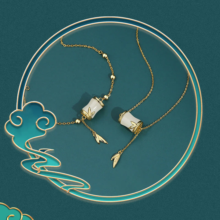 Collier pendentif porte-bonheur en feuille de bambou en jade blanc Hetian en argent sterling 925 et or 22 carats avec Buddha Stones