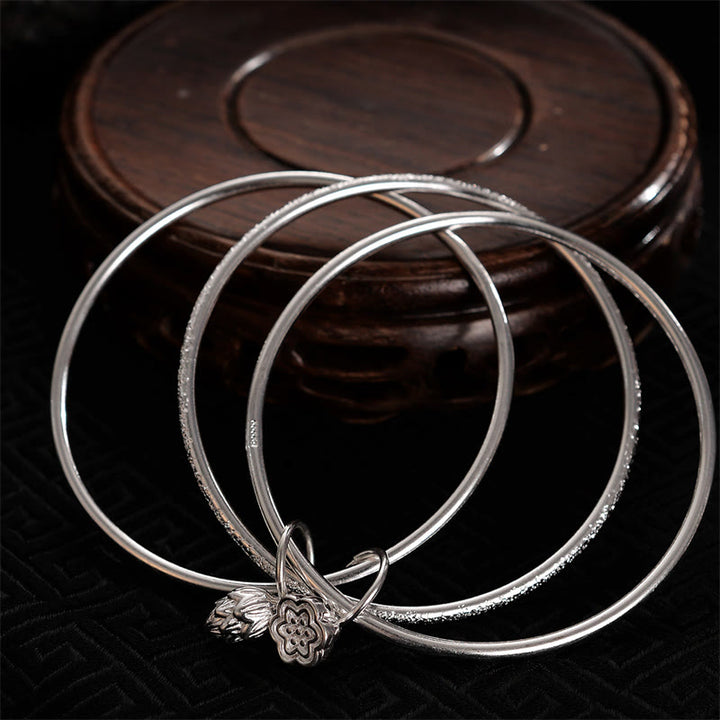Bracelet jonc en cuivre blanc avec fleur de lotus et Buddha Stones