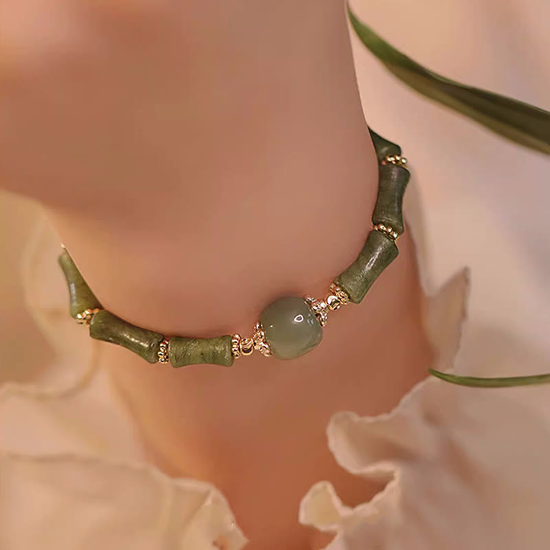 Bracelet porte-bonheur en jade Hetian péridot plaqué cuivre 14 carats avec Buddha Stones et motif bambou
