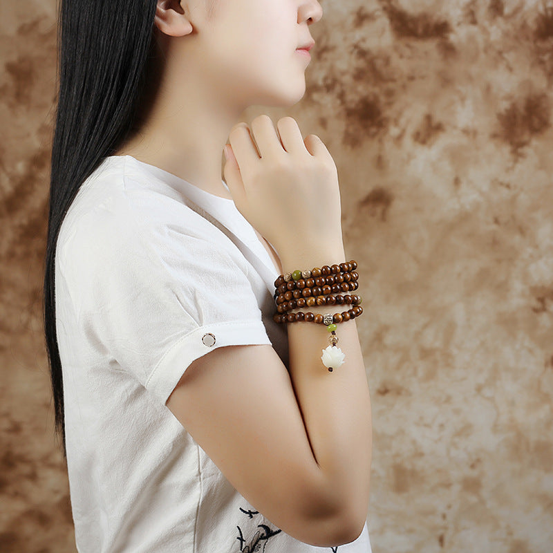 Collier et bracelet de protection en bois de rose tibétain avec Buddha Stones et lotus