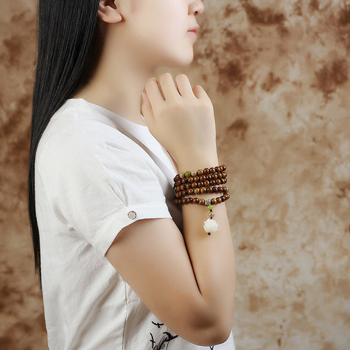 Collier et bracelet de protection en bois de rose tibétain avec Buddha Stones et lotus