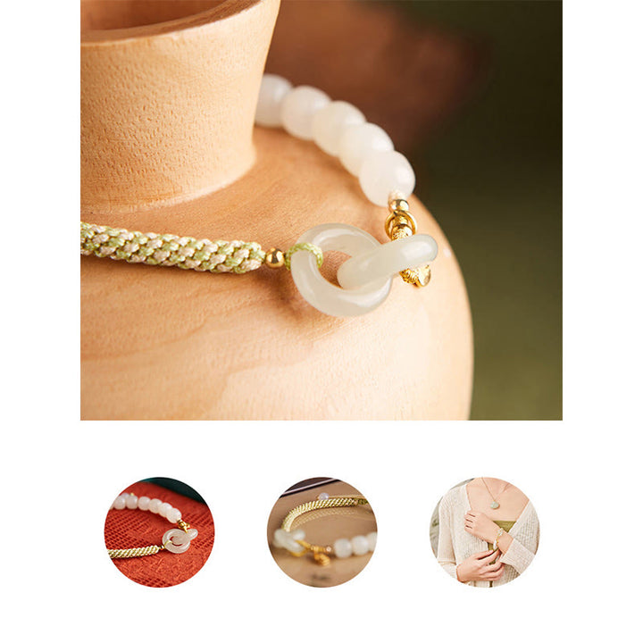 Bracelet tressé en perles de jade Hetian naturelles de Buddha Stones avec boucle de paix double et caractère Fu