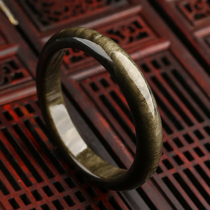 Bracelet de protection en obsidienne dorée et argentée avec Buddha Stones