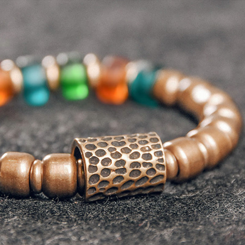 Bracelet tibétain en perles de verre colorées et en cuivre