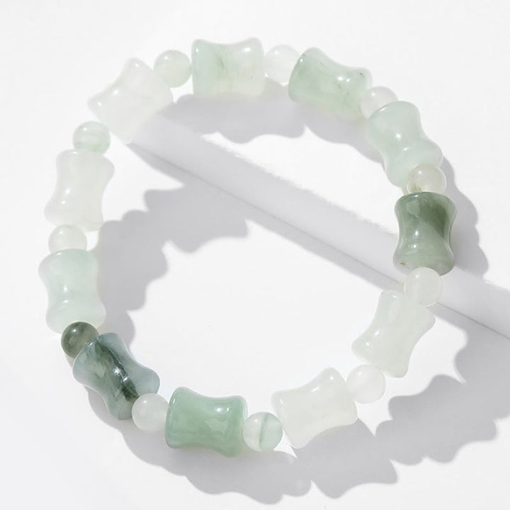 Bracelet porte-bonheur en jade et coquille de noix de coco Buddha Stones et motif bambou