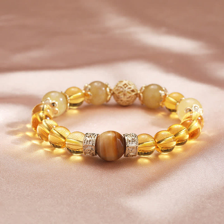 Bracelet de perles de prospérité et de générosité en Buddha Stones et citrine