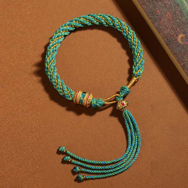 Bracelet tibétain en corde tressée avec breloque porte-bonheur Thangka en Buddha Stones