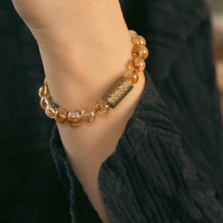 Bracelet de protection en perles de cristal de citrine naturelle et de laiton Buddha Stones