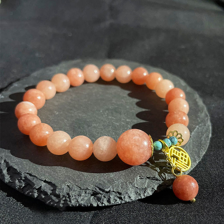Bracelet porte-bonheur en Buddha Stones orange naturelle turquoise avec personnage Fu