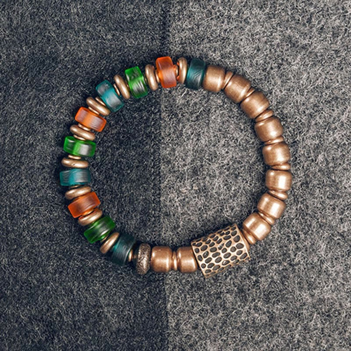 Bracelet tibétain en perles de verre colorées et en cuivre