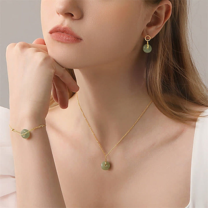 Boucles d'oreilles pendantes en jade avec Buddha Stones rondes et boucle de paix