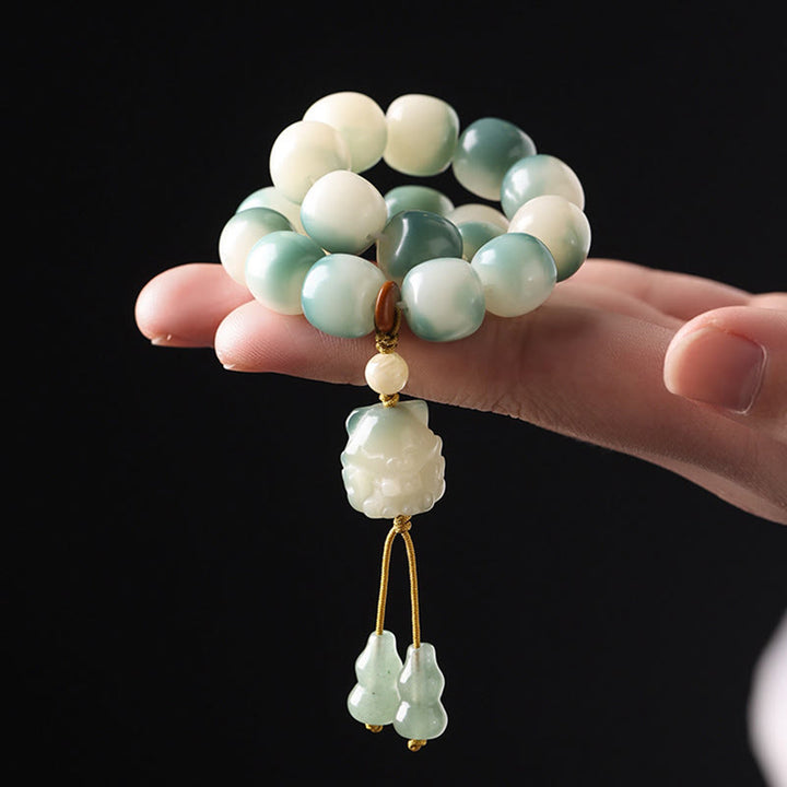 Bracelet de paix en forme de pomme de pin et de patte de chat, motif de Buddha Stones dégradées, graines de Bodhi, renard à neuf queues - image 4