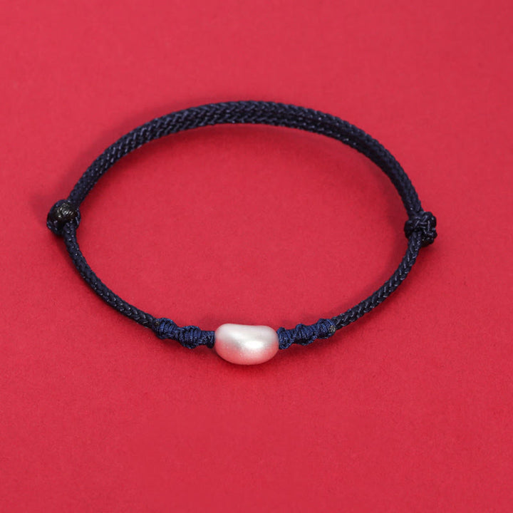 Bracelet tressé fait main en argent sterling 999 avec motif de haricot et Buddha Stones