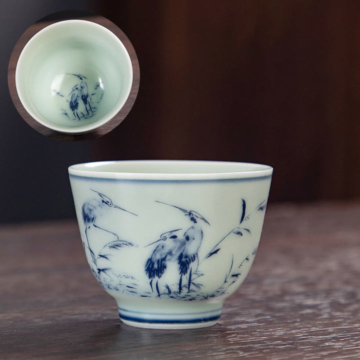Buddha Stones Paysage bleu Montagnes Lotus Chat mignon Pavillons Magnolia Roseaux Aigrettes Tasse à thé en céramique Petite tasse à thé Kung Fu