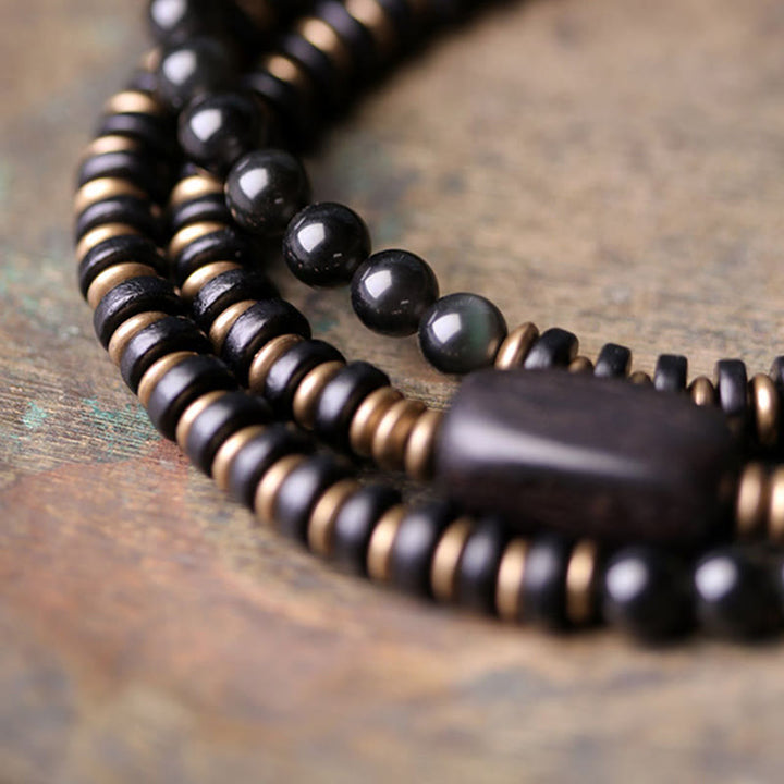 Bracelet triple tour de guérison en cuivre et bois d'ébène avec Buddha Stones arc-en-ciel et obsidienne