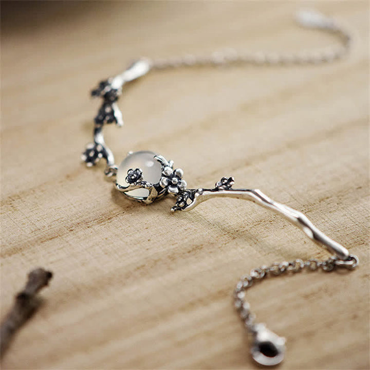 Bracelet positif en calcédoine et fleur de prunier avec Buddha Stones