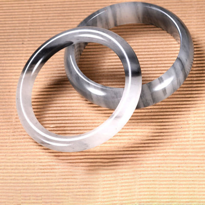 Bracelet de richesse en jade doré et soie couleur encre naturelle Buddha Stones