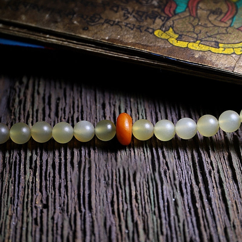 Bracelet porte-bonheur en ambre avec 108 Buddha Stones de Mala en corne de mouton du Tibet