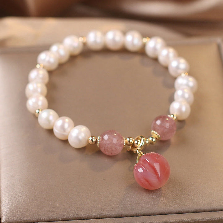 Bracelet à Buddha Stones en perles naturelles et quartz fraise, pêche, amour, cœur, sagesse