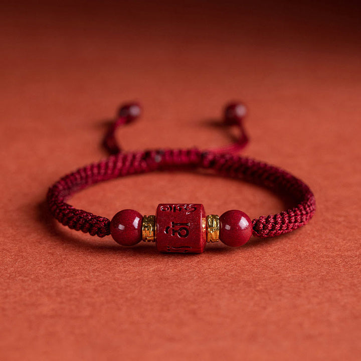 Bracelet tressé avec Buddha Stones tibétaines en cinabre Om Mani Padme Hum gravé et bénédiction