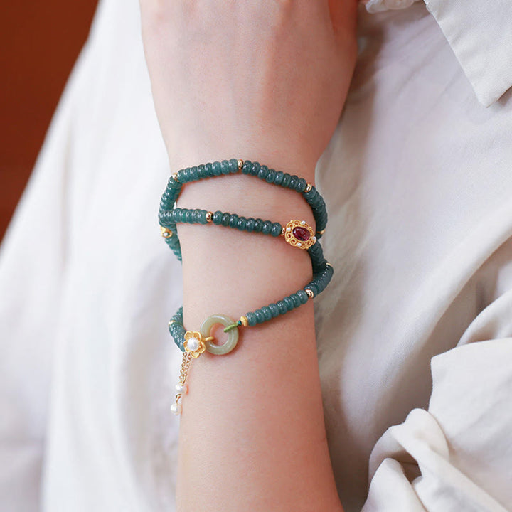 Bracelet triple tour en argent sterling 925 plaqué or avec fleur de jade cyan et boucle de paix Buddha Stones
