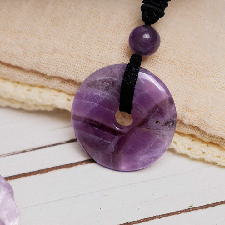 Collier avec pendentif porte-bonheur en Buddha Stones précieuses en cristal de guérison