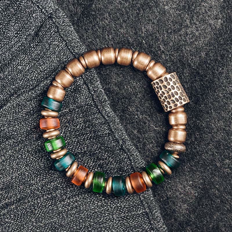 Bracelet tibétain en perles de verre colorées et en cuivre
