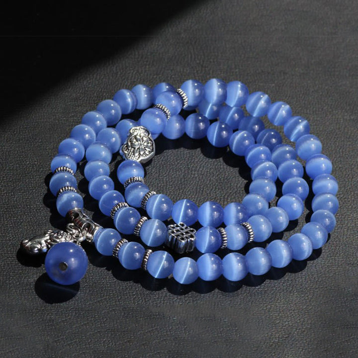 Bracelet triple tour de soutien PiXiu œil de chat en Buddha Stones
