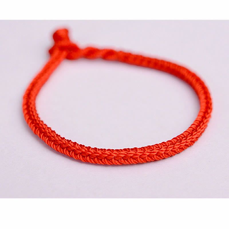 Bracelet tibétain en corde tressée à huit fils avec nœud de paix et protection fait main en Buddha Stones
