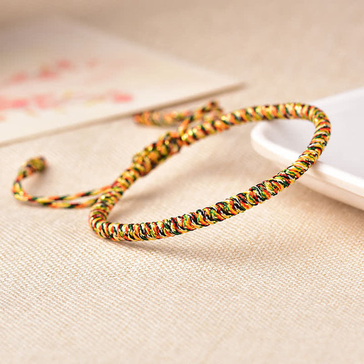 Bracelet tibétain porte-bonheur avec 3 Buddha Stones et cordon rouge