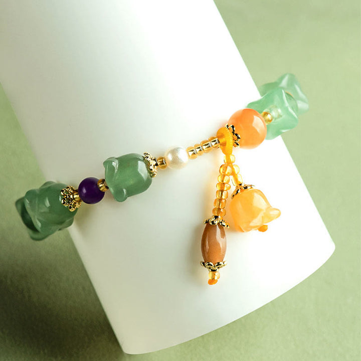 Bracelet porte-bonheur en aventurine verte et fleur de magnolia de Buddha Stones