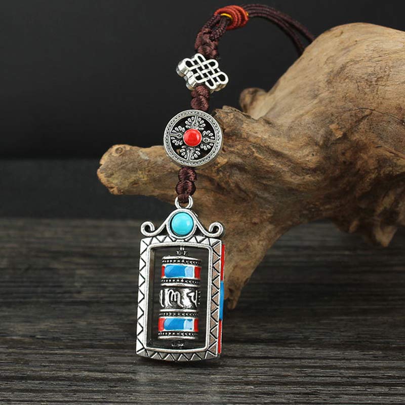 Porte-clés décoratif avec nœud rotatif et bénédiction en forme de roue de prière en six mots vrais en Buddha Stones
