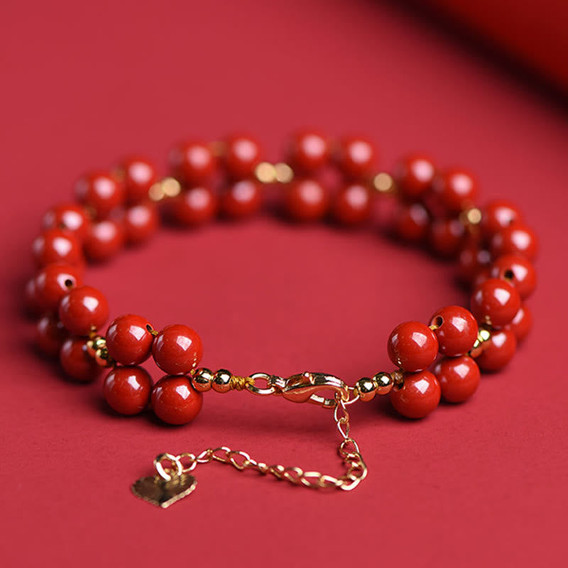 Bracelet de bénédiction en perles de cinabre naturelles de Buddha Stones