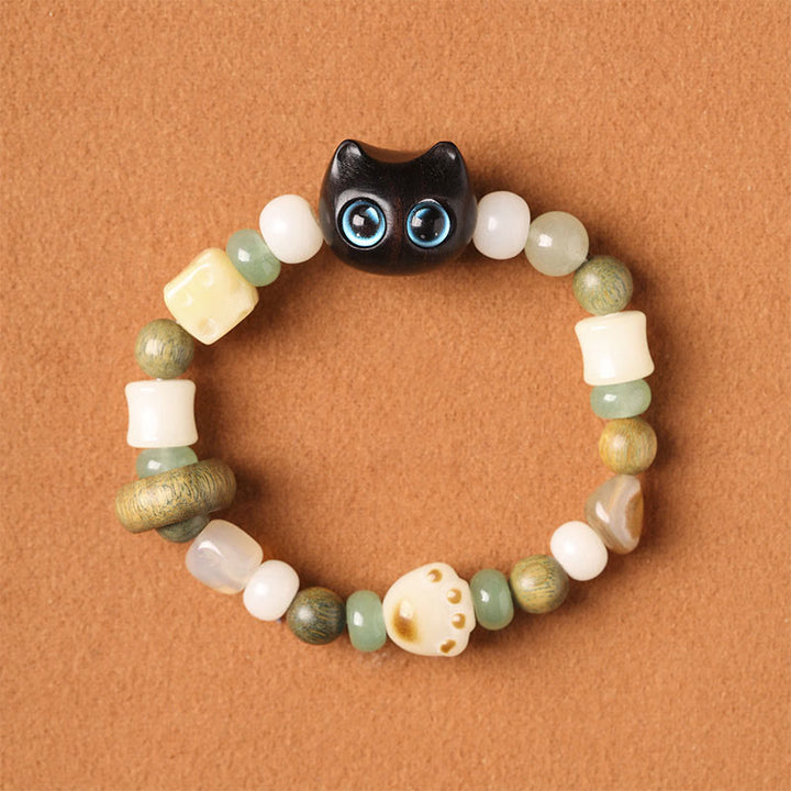 Buddha Stones Graine de Bodhi Bois de santal vert Bois d'ébène Petite feuille Bois de santal rouge Tête de chat Patte Griffe Bracelet de paix - image 2