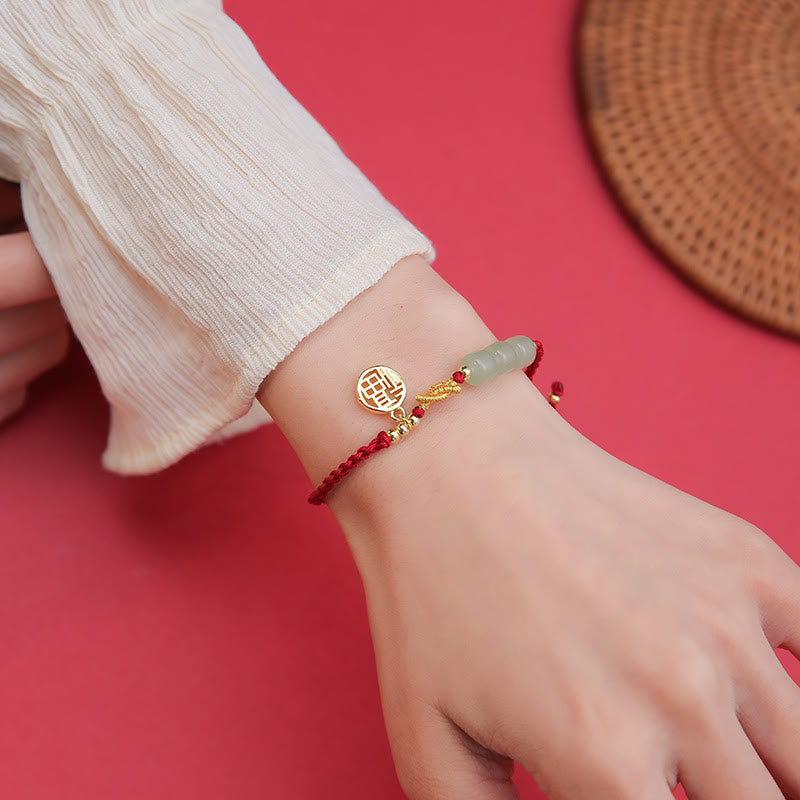 Bracelet porte-bonheur en corde rouge avec perles de jade fabriquées à la main par Buddha Stones