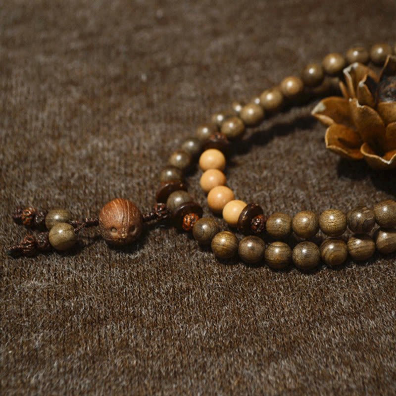 Bracelet Mala avec breloque de protection en bois de santal tibétain et Buddha Stones