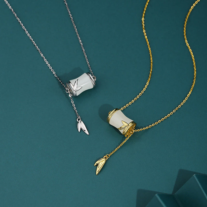 Collier pendentif porte-bonheur en feuille de bambou en jade blanc Hetian en argent sterling 925 et or 22 carats avec Buddha Stones