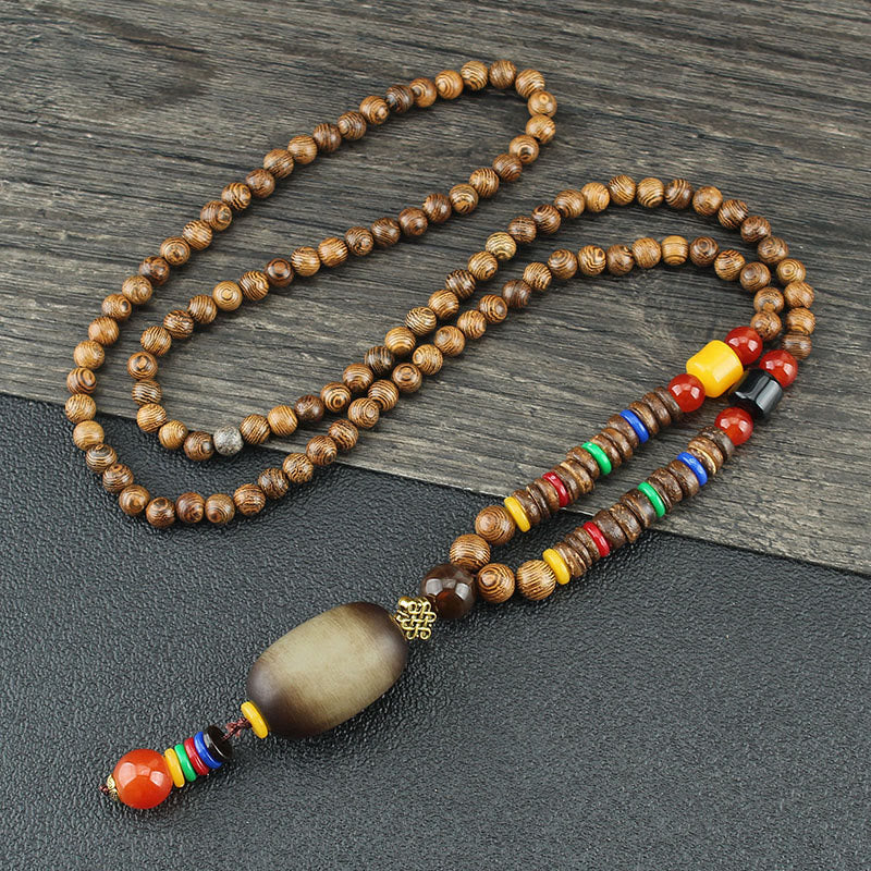 Collier pendentif en Buddha Stones tibétain en bois de wengé Bodhi Seed Agate Balance Peace
