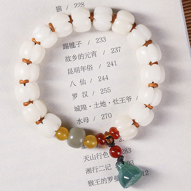 Bracelet en perles de citrouille gravées en agate rouge Bodhi Calme Harmonie Bodhi Graines naturelles Lotus