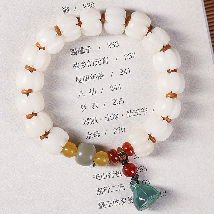 Bracelet en perles de citrouille gravées en agate rouge Bodhi Calme Harmonie Bodhi Graines naturelles Lotus