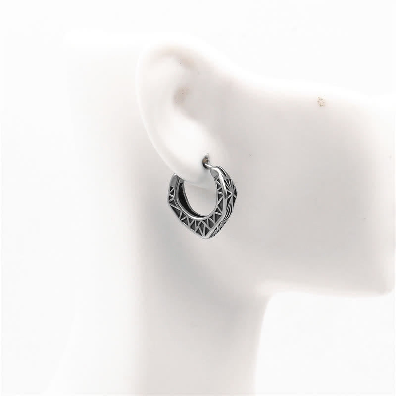 Boucles d'oreilles créoles Viking en acier titane - image 3