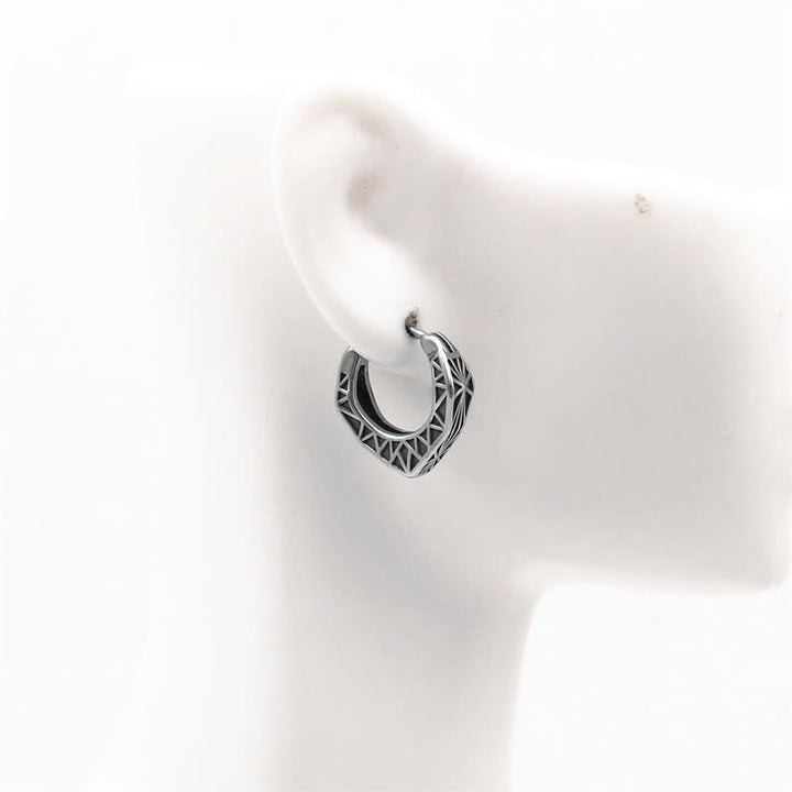 Boucles d'oreilles créoles Viking en acier titane - image 3